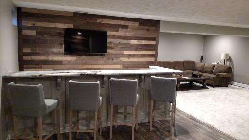 Entertainment room with custom bar