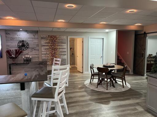 Finished basement with bar seating