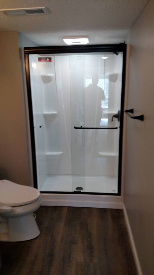 Finished Bathroom Shower with Sliding Door