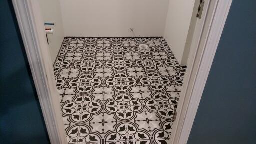 Finished Basement Bathroom with Tile Flooring