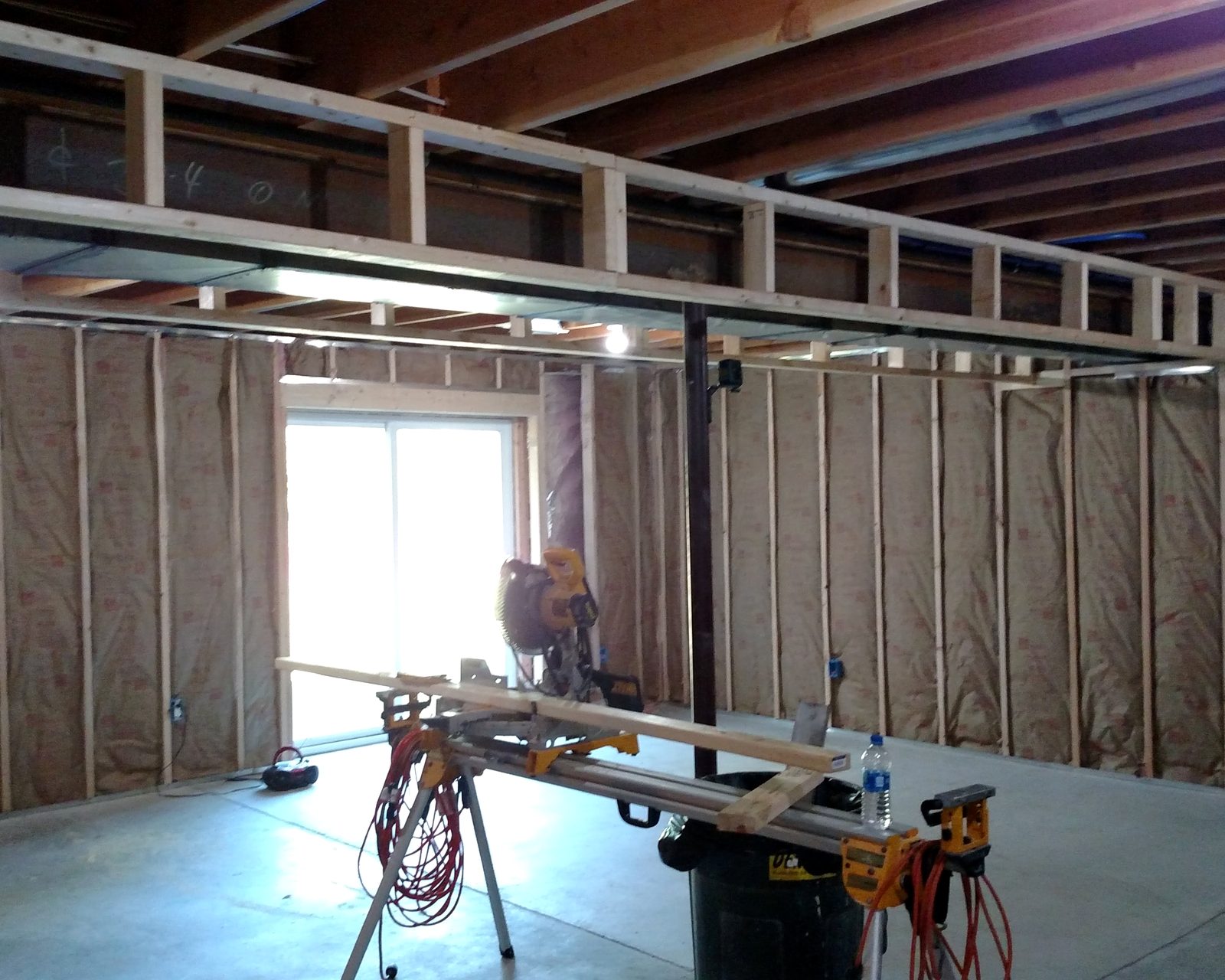 Insulated stud walls and framed bulkhead