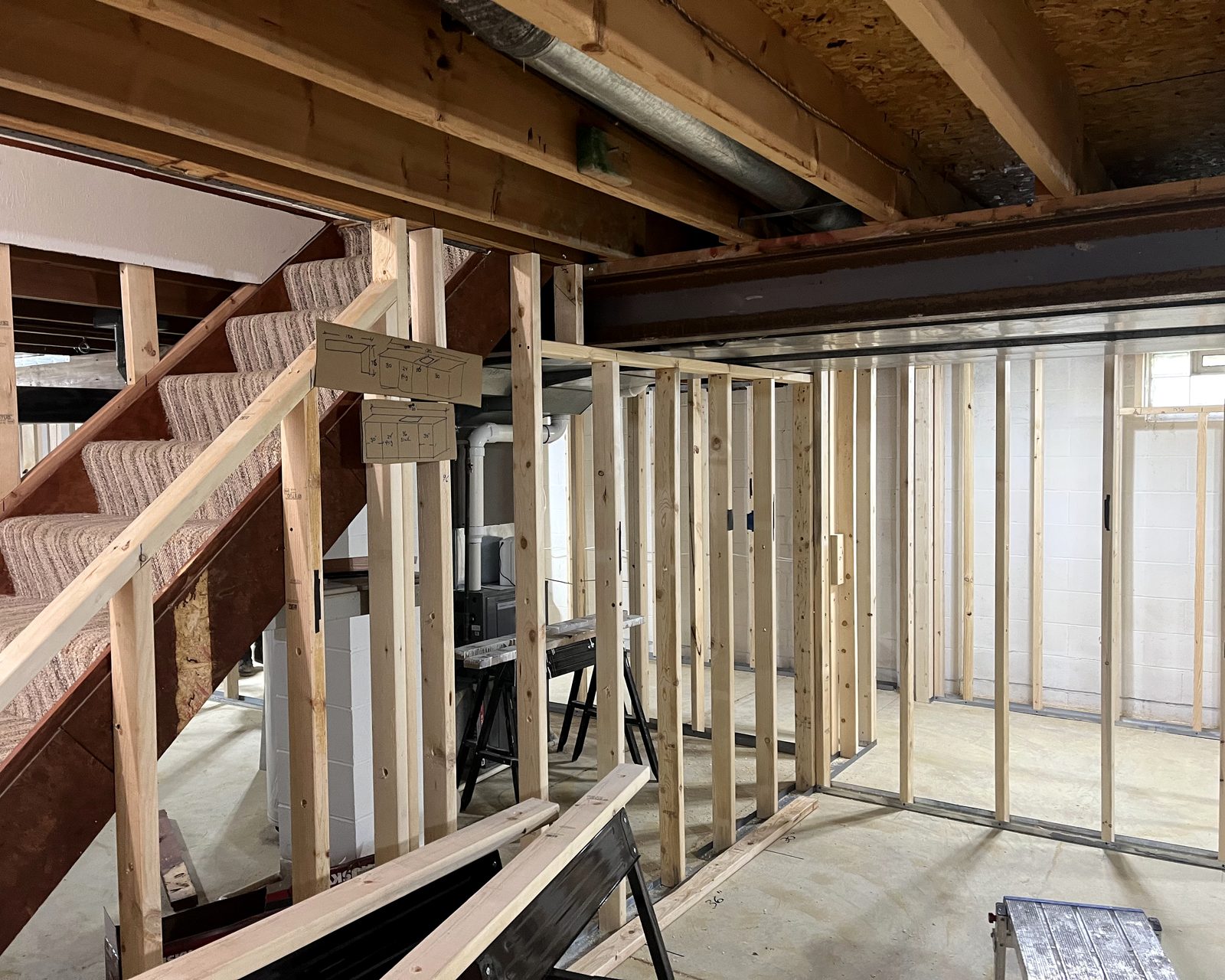 Wall framing around basement stairs