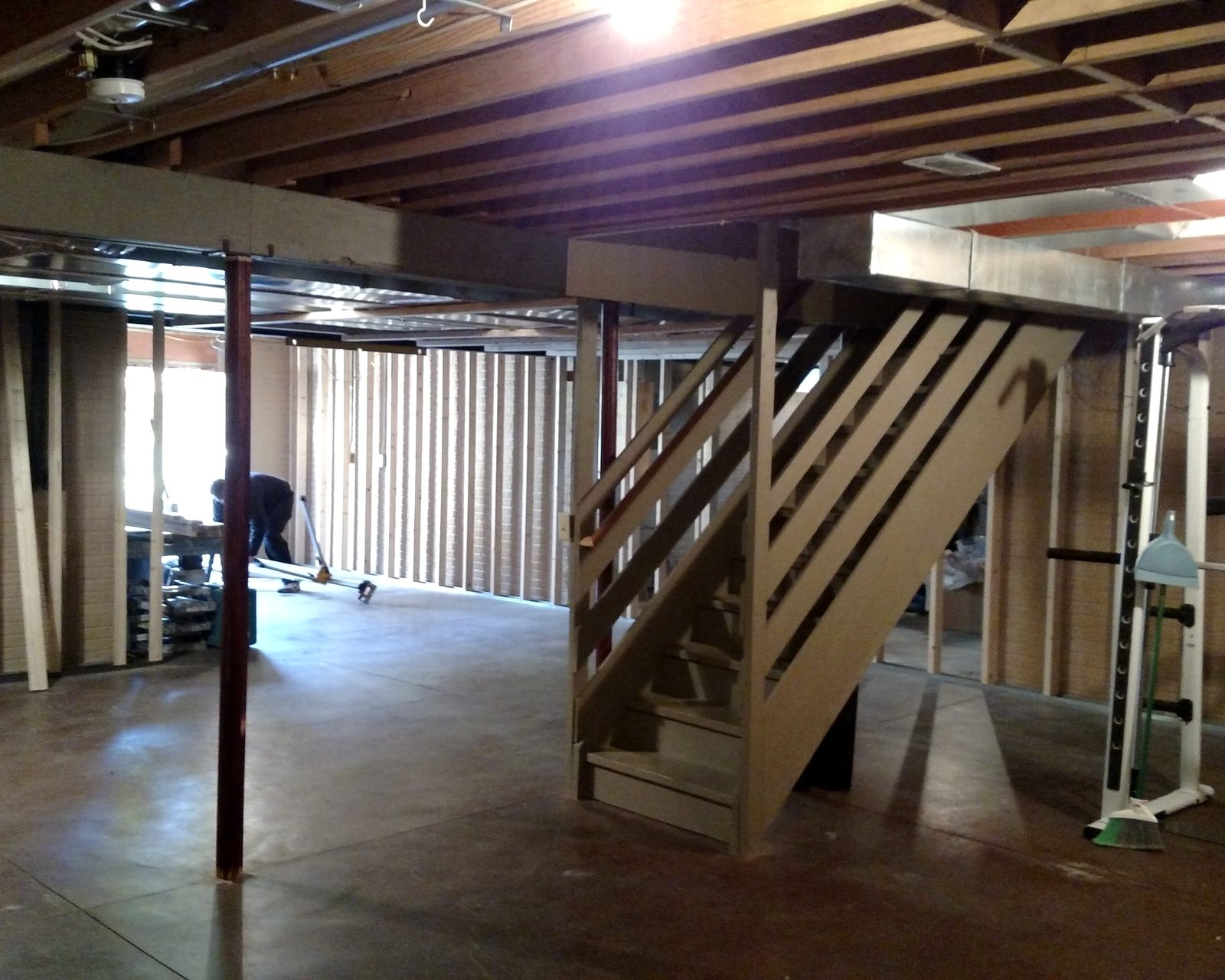 Basement framing in progress with crew on site
